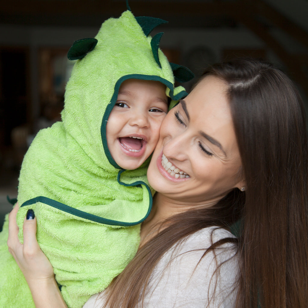 bamboo dinosaur character towel with large hood and popper under chin